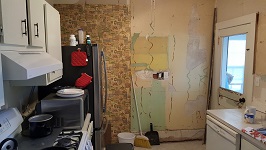 Half Done Removing The Drywall And Panelling